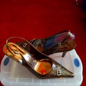 Brown sling back snakeskin heels